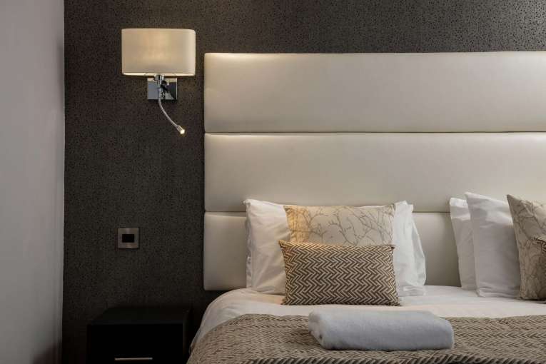 Barnstaple Hotel Deluxe Room Accommodation Bed and Headboard with Light